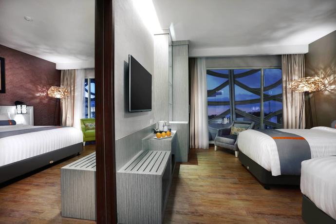 Imagen de la habitación del Hotel Harper Perintis by ASTON. Foto 11