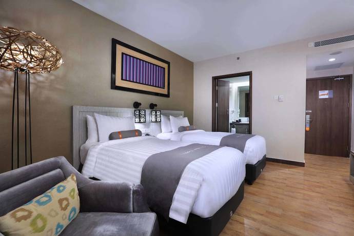 Imagen de la habitación del Hotel Harper Perintis by ASTON. Foto 13