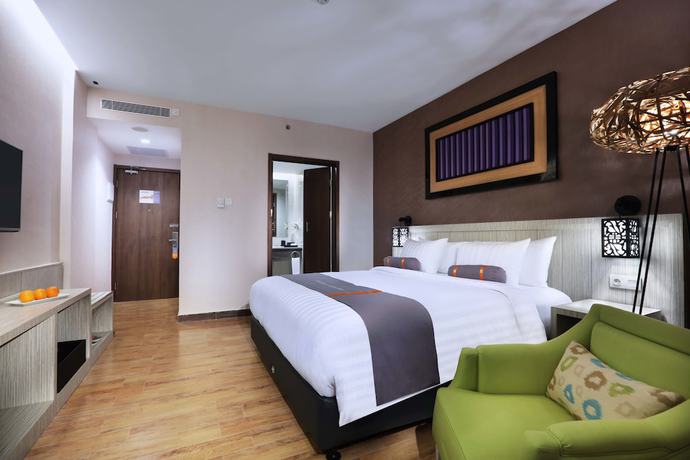 Imagen de la habitación del Hotel Harper Perintis by ASTON. Foto 14