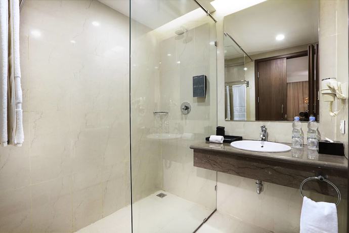 Imagen de la habitación del Hotel Harper Perintis by ASTON. Foto 16