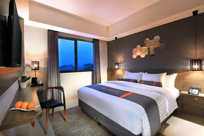Imagen de la habitación del Hotel Harper Purwakarta. Foto 15