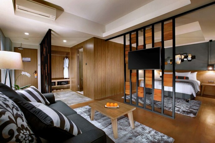 Imagen de la habitación del Hotel Harper Purwakarta. Foto 18