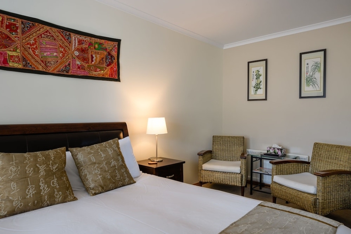 Imagen de la habitación del Hotel Harpers On The Beach. Foto 2