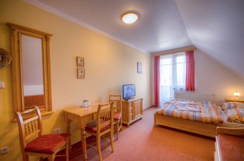 Imagen de la habitación del Hotel Harrachovsk&aacute; Hacienda. Foto 3