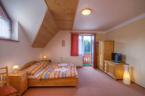 Imagen de la habitación del Hotel Harrachovsk&aacute; Hacienda. Foto 10