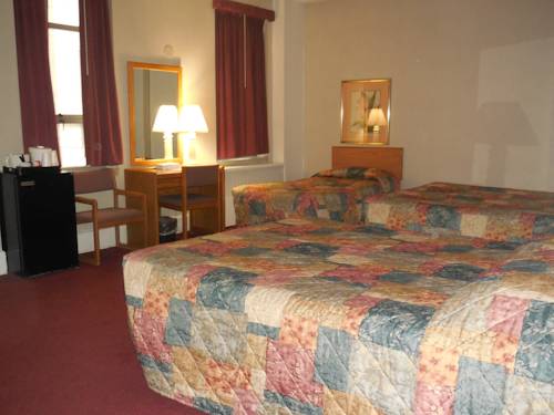 Imagen de la habitación del Hotel Harrington. Foto 16