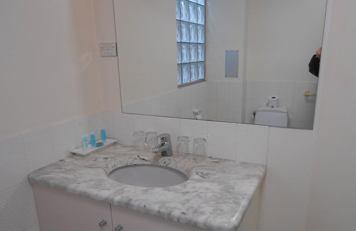 Imagen de la habitación del Hotel Harrington's 102. Foto 10
