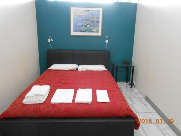 Imagen de la habitación del Hotel Harrington's 102. Foto 11