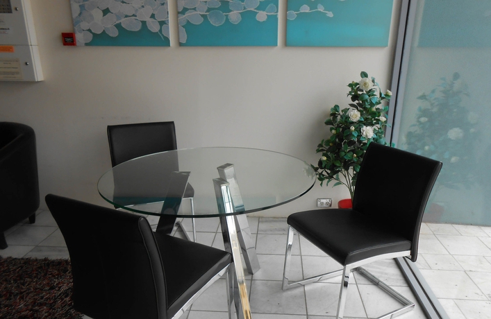 Imagen de los interiores del Hotel Harrington's 102. Foto 16