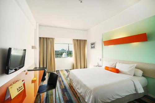 Imagen de la habitación del Hotel Harris Batam Center - Batam. Foto 7
