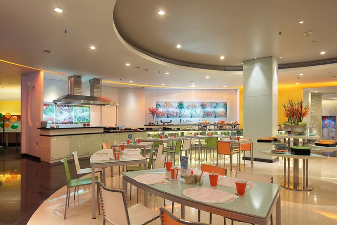 Imagen del bar/restaurante del Hotel Harris Tebet Jakarta. Foto 2