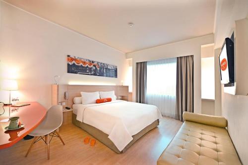 Imagen de la habitación del Hotel Harris Tebet Jakarta. Foto 6