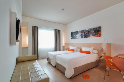 Imagen de la habitación del Hotel Harris Tebet Jakarta. Foto 7