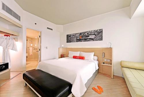 Imagen de la habitación del Hotel Harris Tebet Jakarta. Foto 9