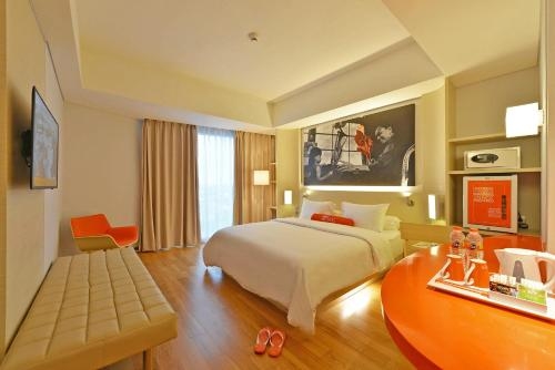 Imagen de la habitación del Hotel Harris & Conventions Solo. Foto 6