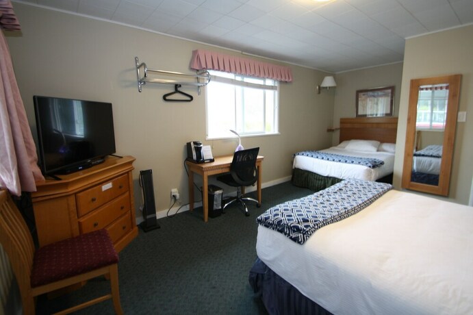 Imagen de la habitación del Hotel Harrison Spa Motel. Foto 19
