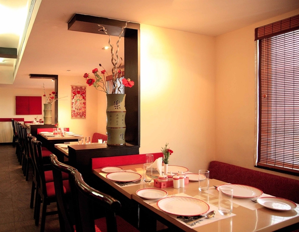 Imagen del bar/restaurante del Hotel Harrisons. Foto 10