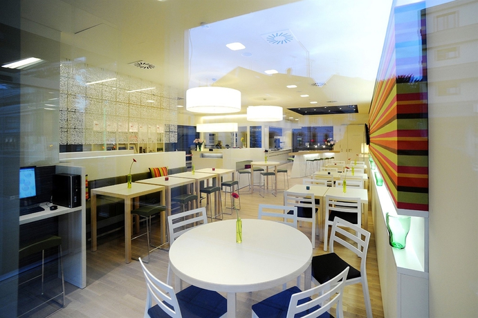 Imagen del bar/restaurante del Hotel Harry’s Home and Apartments, Dornbirn. Foto 2