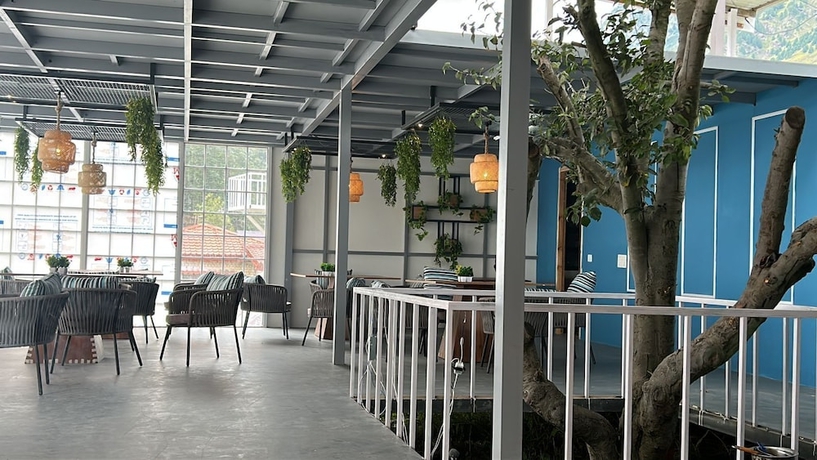 Imagen del bar/restaurante del Hotel Harsil Village Resort. Foto 8