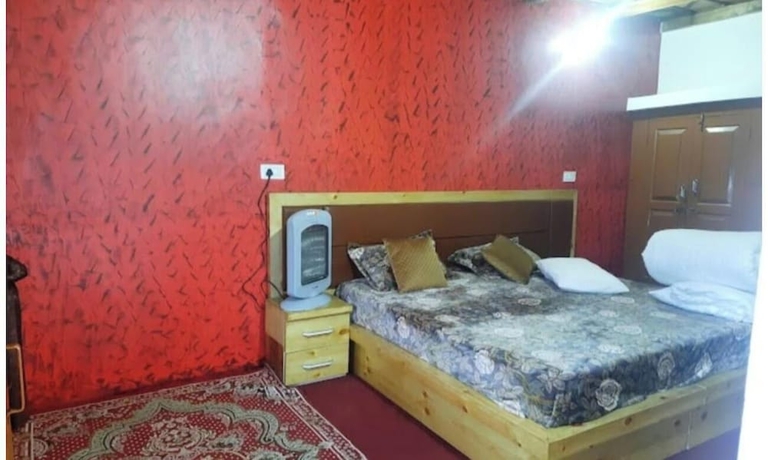 Imagen de la habitación del Hotel Harsil apple homestay. Foto 13