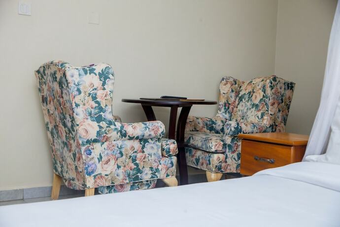 Imagen de la habitación del Hotel Harts Motel. Foto 12