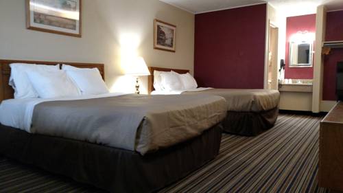 Imagen de la habitación del Hotel Harvest Drive Family Inn. Foto 9