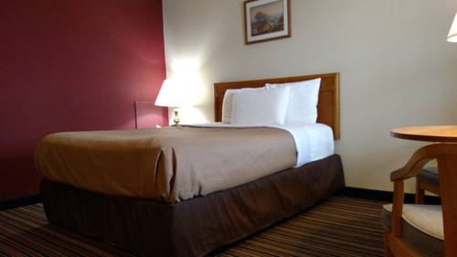 Imagen de la habitación del Hotel Harvest Drive Family Inn. Foto 11