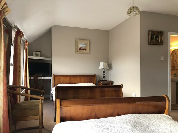 Imagen de la habitación del Hotel Harvey\'s Guesthouse. Foto 17