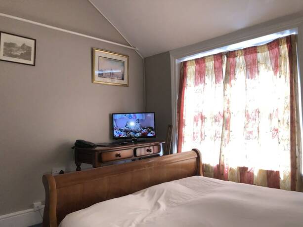 Imagen de la habitación del Hotel Harvey\'s Guesthouse. Foto 19