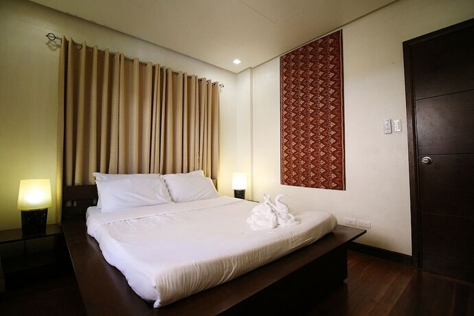 Imagen de la habitación del Hotel Hassaram Courtyard. Foto 18