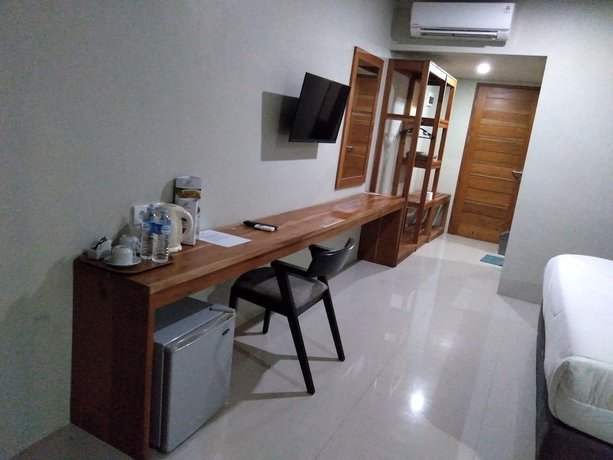 Imagen de la habitación del Hotel Hastina Lombok. Foto 8