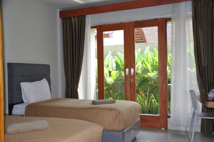 Imagen de la habitación del Hotel Hastina Lombok. Foto 13