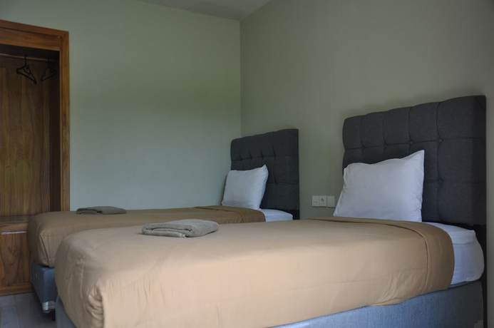Imagen de la habitación del Hotel Hastina Lombok. Foto 16