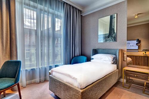 Imagen de la habitación del Hotel Haston Old Town. Foto 11