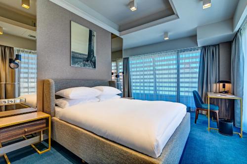 Imagen de la habitación del Hotel Haston Old Town. Foto 15