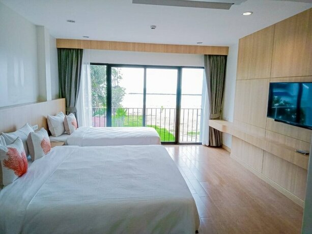 Imagen de la habitación del Hotel Hatchao Heritage Beachfront Resort. Foto 18