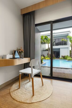 Imagen de la habitación del Hotel Hatchao Heritage Beachfront Resort. Foto 19