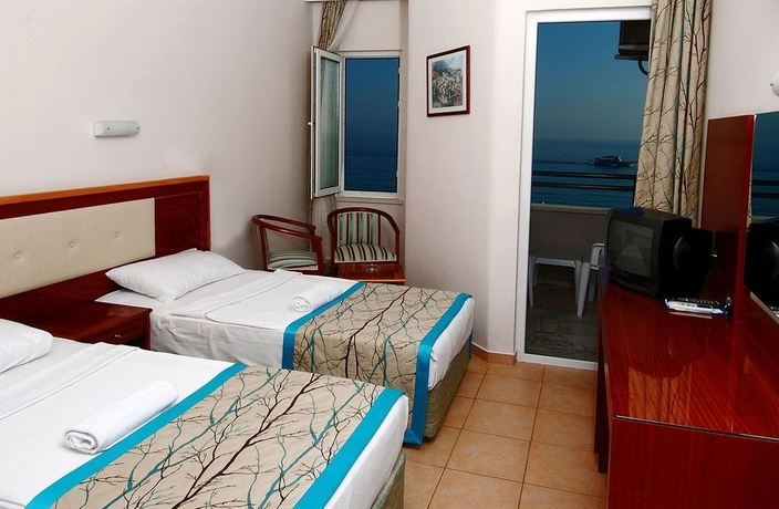 Imagen de la habitación del Hotel Hatipoglu Beach. Foto 6
