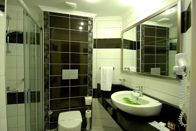 Imagen de la habitación del Hotel Hatipoglu Beach. Foto 8