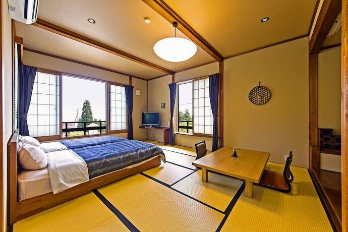 Imagen de la habitación del Hotel Hatsune. Foto 18