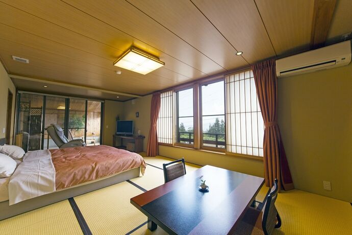 Imagen de la habitación del Hotel Hatsune. Foto 27