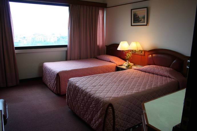 Imagen de la habitación del Hotel Hatyai Central. Foto 14
