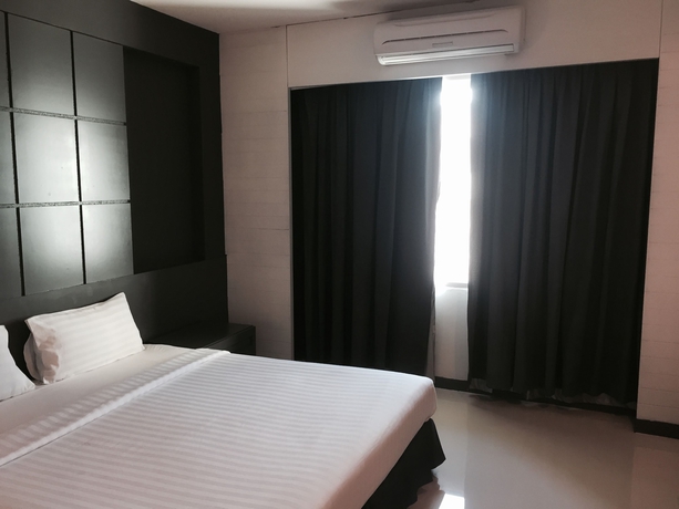 Imagen de la habitación del Hotel Hatyai Holiday. Foto 8