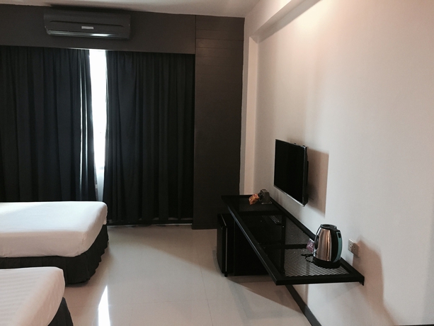 Imagen de la habitación del Hotel Hatyai Holiday. Foto 16