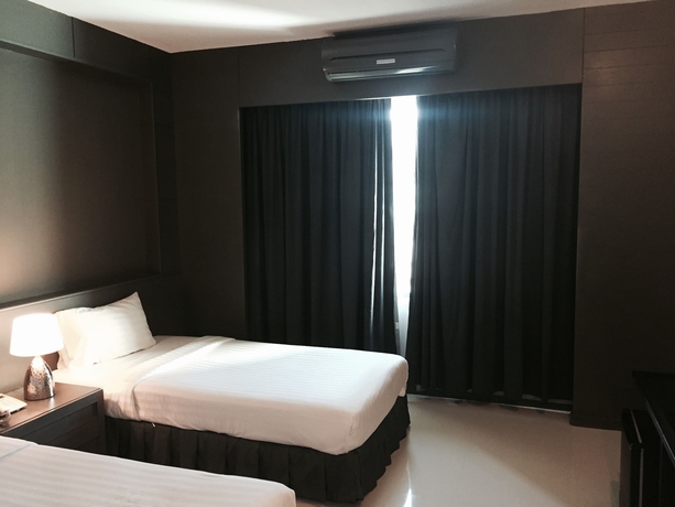 Imagen de la habitación del Hotel Hatyai Holiday. Foto 17