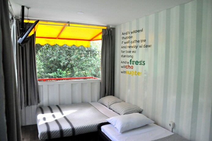 Imagen de la habitación del Hotel Hau Eco Lodges Citumang. Foto 3