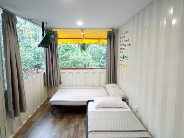 Imagen de la habitación del Hotel Hau Eco Lodges Citumang. Foto 5