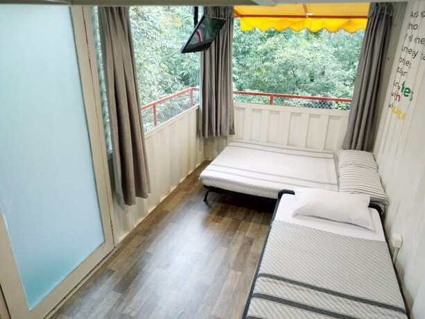Imagen de la habitación del Hotel Hau Eco Lodges Citumang. Foto 12
