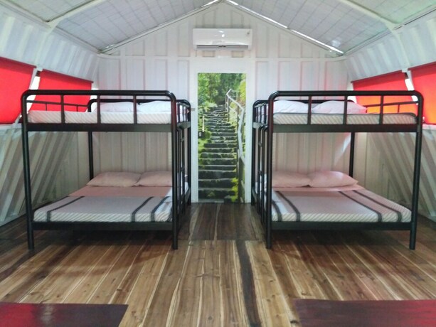 Imagen de la habitación del Hotel Hau Eco Lodges Citumang. Foto 13