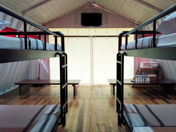 Imagen de la habitación del Hotel Hau Eco Lodges Citumang. Foto 14